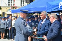 Rafał RAJKOWSKI oraz nadkomisarz Robert FARYNA