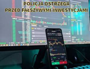 telefon komórkowy a w tle ekran z wynikami inwestycji na giełdzie