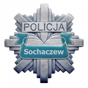 Logo policji w kształcie gwiazdy. Na niebieskim pasku przechodzącym przez środek napisano Sochaczew