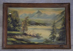 Obraz w ramie przedstawiający widok na jezioro i góry