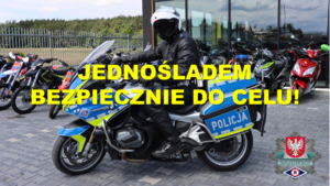 Policjant na motocyklu policyjnym. Na środku jest napis Jednośladem bezpiecznie do celu