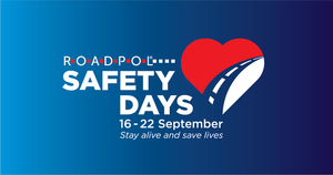 Niebieskie tło z czerwonym sercem. Na niebieskim tle napis RoadPol Safety Days