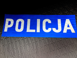 Tablica niebieska z napisem Policja